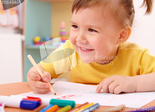 Image of Little girl draw with felt-tip pen