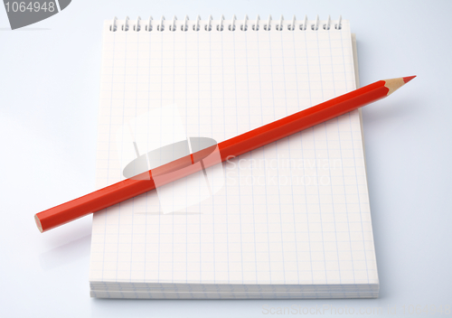 Image of Blank notepad and a pencil