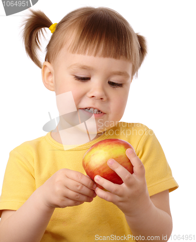 Image of Cute child with red apple