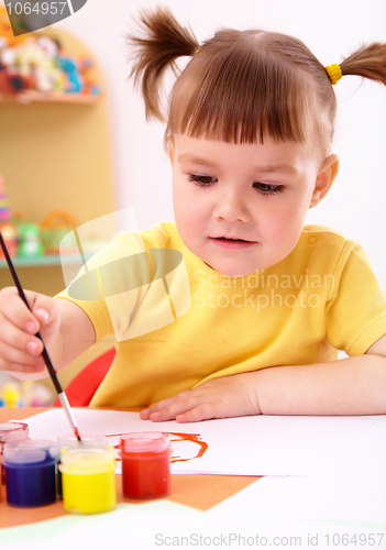Image of Child play with paints in preschool