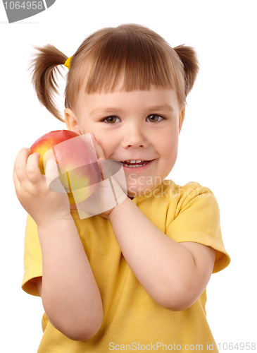 Image of Cute child with red apple