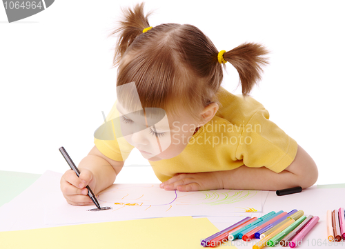 Image of Cute child draws with felt-tip pens