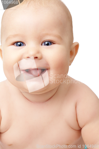 Image of Happy toddler smiling, sticking his tongue out