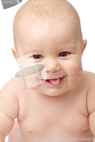 Image of Happy toddler smiling, sticking his tongue out