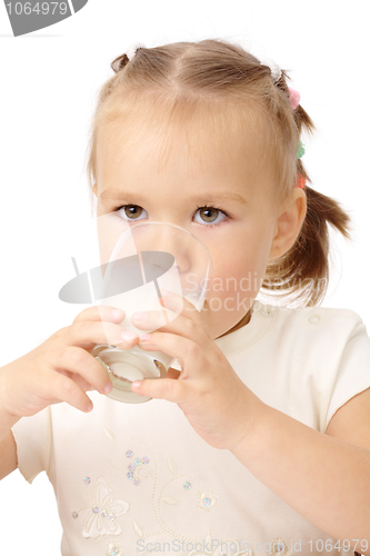 Image of Little girl drinks milk