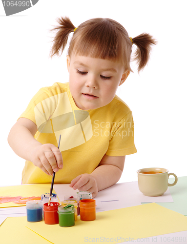 Image of Cute child play with paints