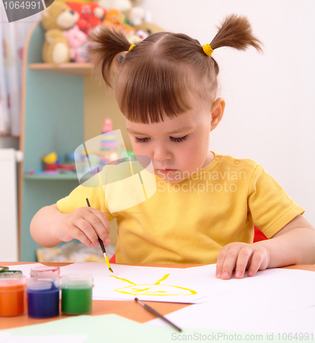 Image of Child draws with paints in preschool