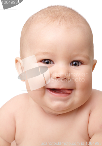 Image of Happy toddler smiling, sticking his tongue out
