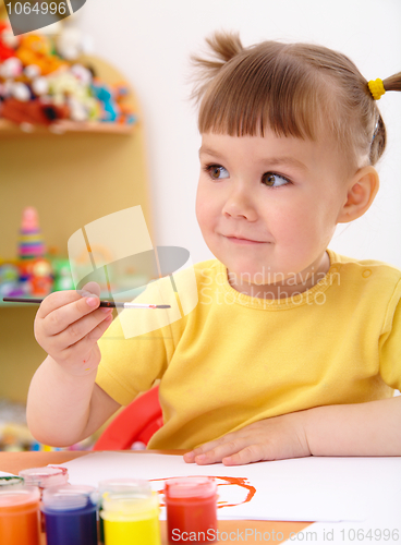 Image of Child draws with paints in preschool