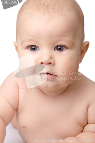Image of Portrait shot of a curious toddler