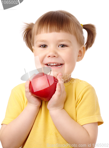 Image of Cute child with apple