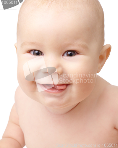 Image of Happy toddler smiling, sticking his tongue out