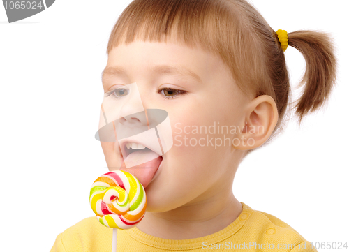 Image of Little girl with lollipop