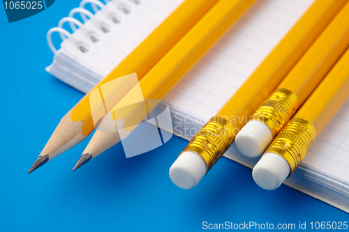 Image of Notepad and few pencils