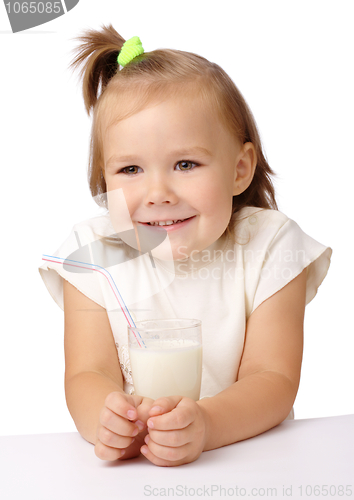 Image of Little girl with a glass of milk