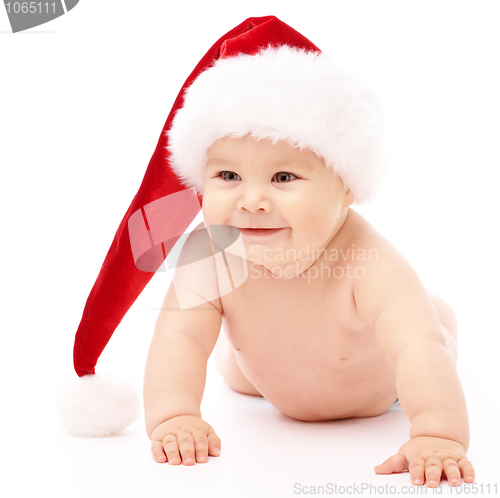 Image of Little child wearing red Christmas cap