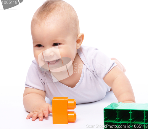 Image of Little boy with building bricks