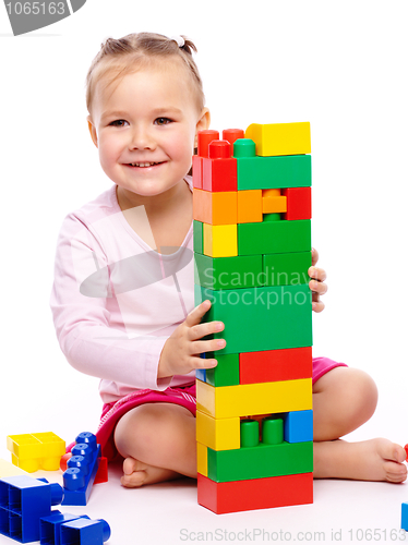 Image of Little girl with building bricks