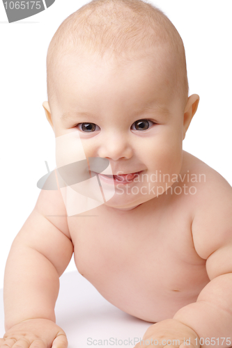 Image of Happy toddler smiling, sticking his tongue out