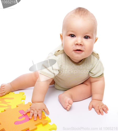 Image of Little boy play with alphabet