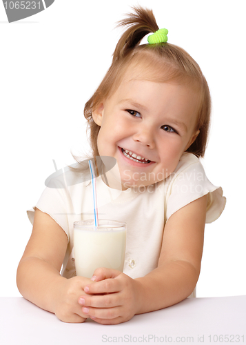 Image of Little girl with a glass of milk