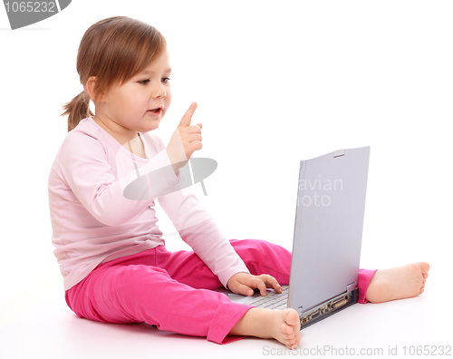 Image of Little girl with laptop