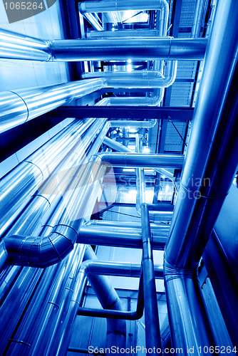 Image of Industrial zone, Steel pipelines in blue tones  