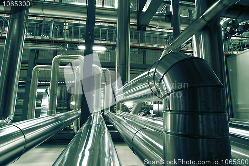 Image of Equipment, cables and piping as found inside of a modern industr