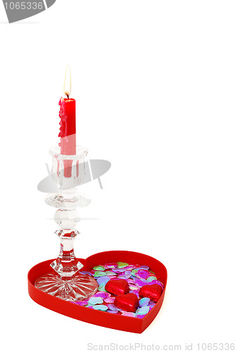 Image of Romantic candle with candies on tray