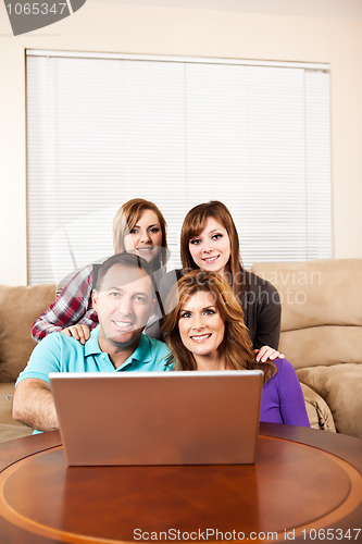 Image of Family at home browsing internet