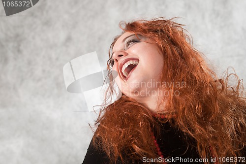 Image of laughing crazy young woman