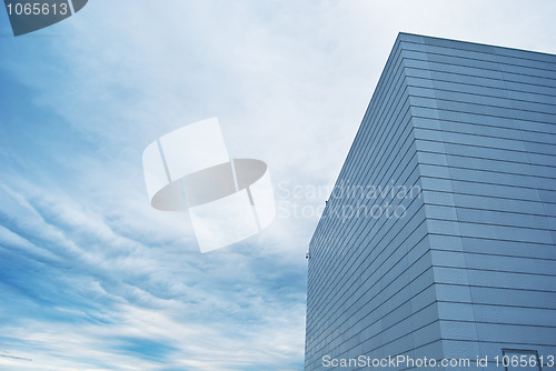 Image of Oslo Opera House wall against blue cloud sky