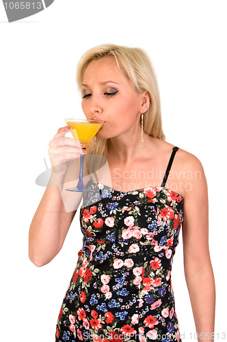 Image of Female drinks martini.