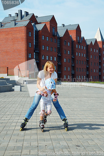 Image of family fun rollerblading