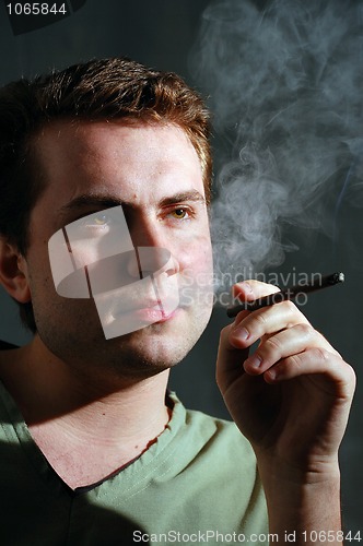 Image of man smoking