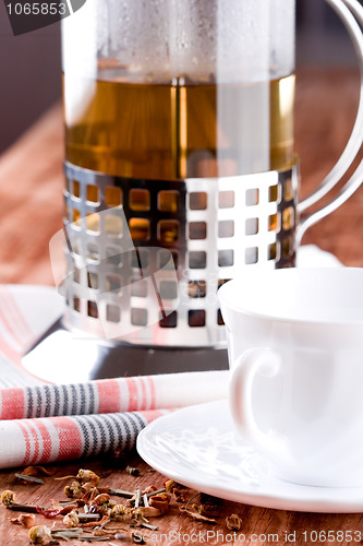 Image of french press with herbal tea 