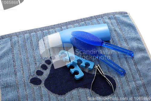 Image of Blue foot SPA on towel with footprint