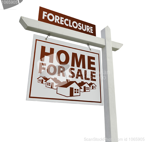 Image of White Foreclosure Home For Sale Real Estate Sign on White