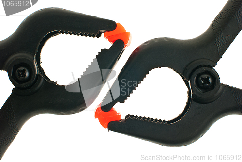 Image of Red and black plastic clamps