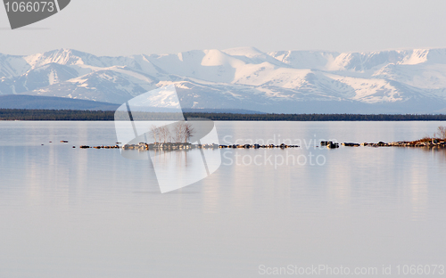 Image of Stony island among lake