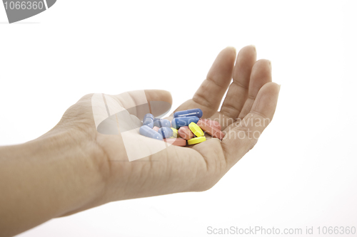 Image of pills in hand