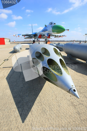 Image of Rocket launcher and a fighter jet