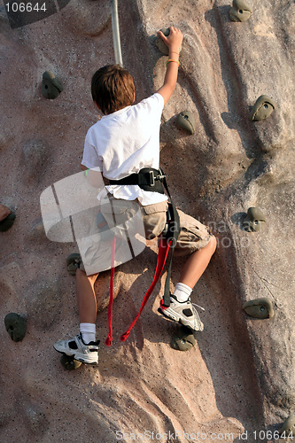 Image of Kid climbing wall