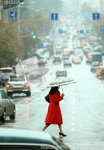 Image of women cross the street