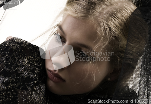 Image of young sad blonde