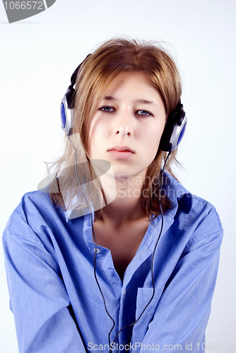 Image of Young girl in headphones   