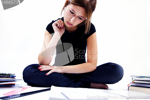 Image of girl spending time in studying 