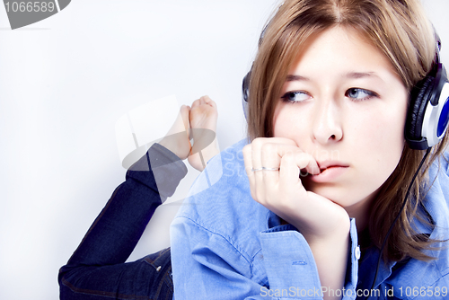 Image of Young girl in headphones  