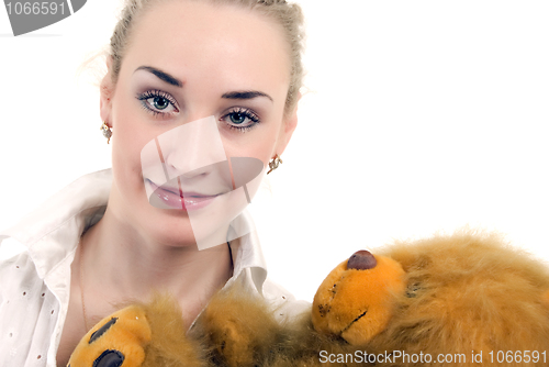 Image of Young woman with teddy bear  