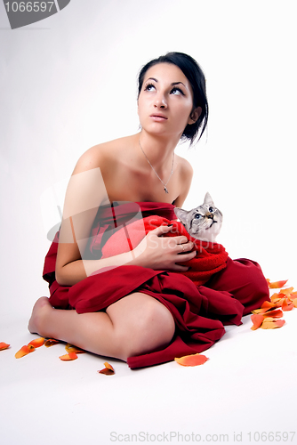 Image of pretty woman with cat   